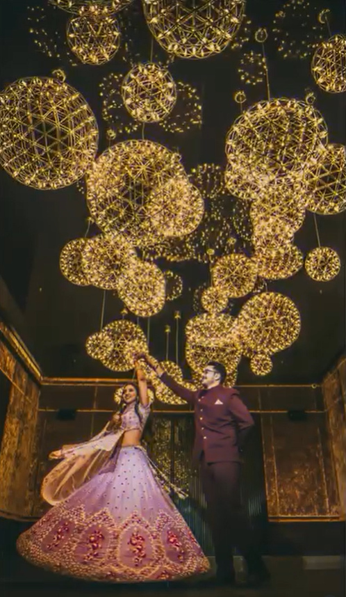 Twirling under golden dreams and crystal lights ❤️